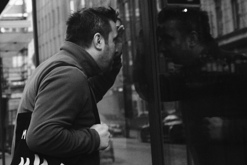 Mihut peeking through a window